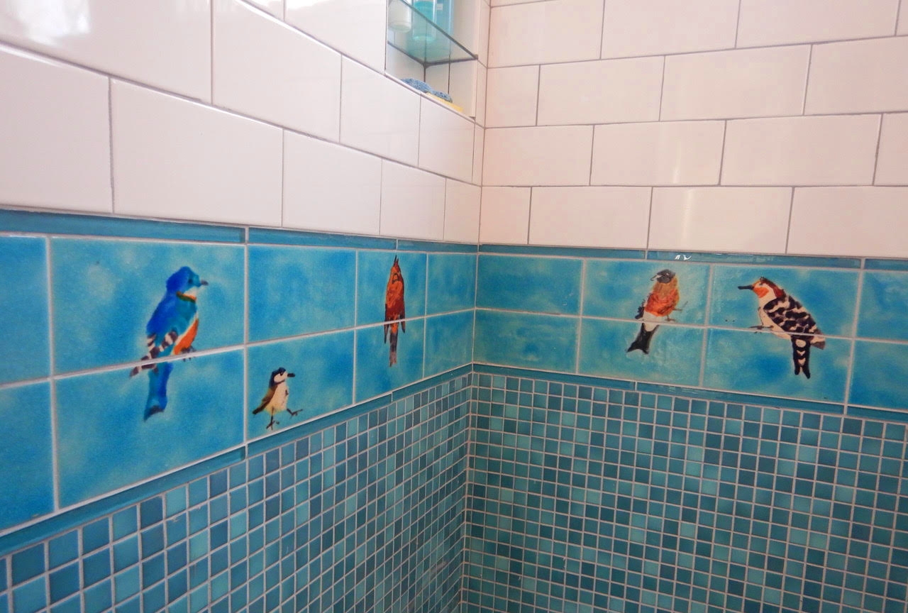 Handmade Bird border tiles in shower 