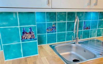 A stunning installation of custom made kitchen splashback tiles