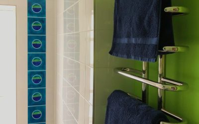 Bright & bold abstract art tiles really bring your bathroom to life !