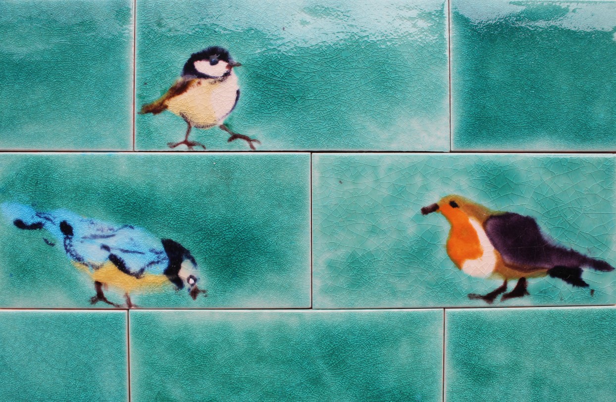 Handmade Bird picture tiles with matching plain tiles